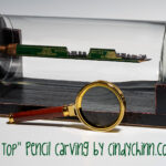 pencil lead carving of train by cindy chinn "Big Top"